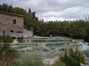 Bathe In Beauty: Vistors to the hot springs near Saturnia can relax in 98.6 degree water.